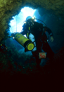 Descending into 54 meter cave